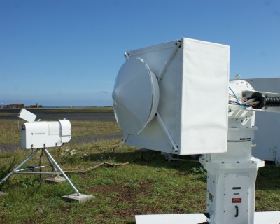 SWACR-1 The new scanning radar (foreground) joins the ARM Mobile Facility instrument suite operating on Graciosa Island.